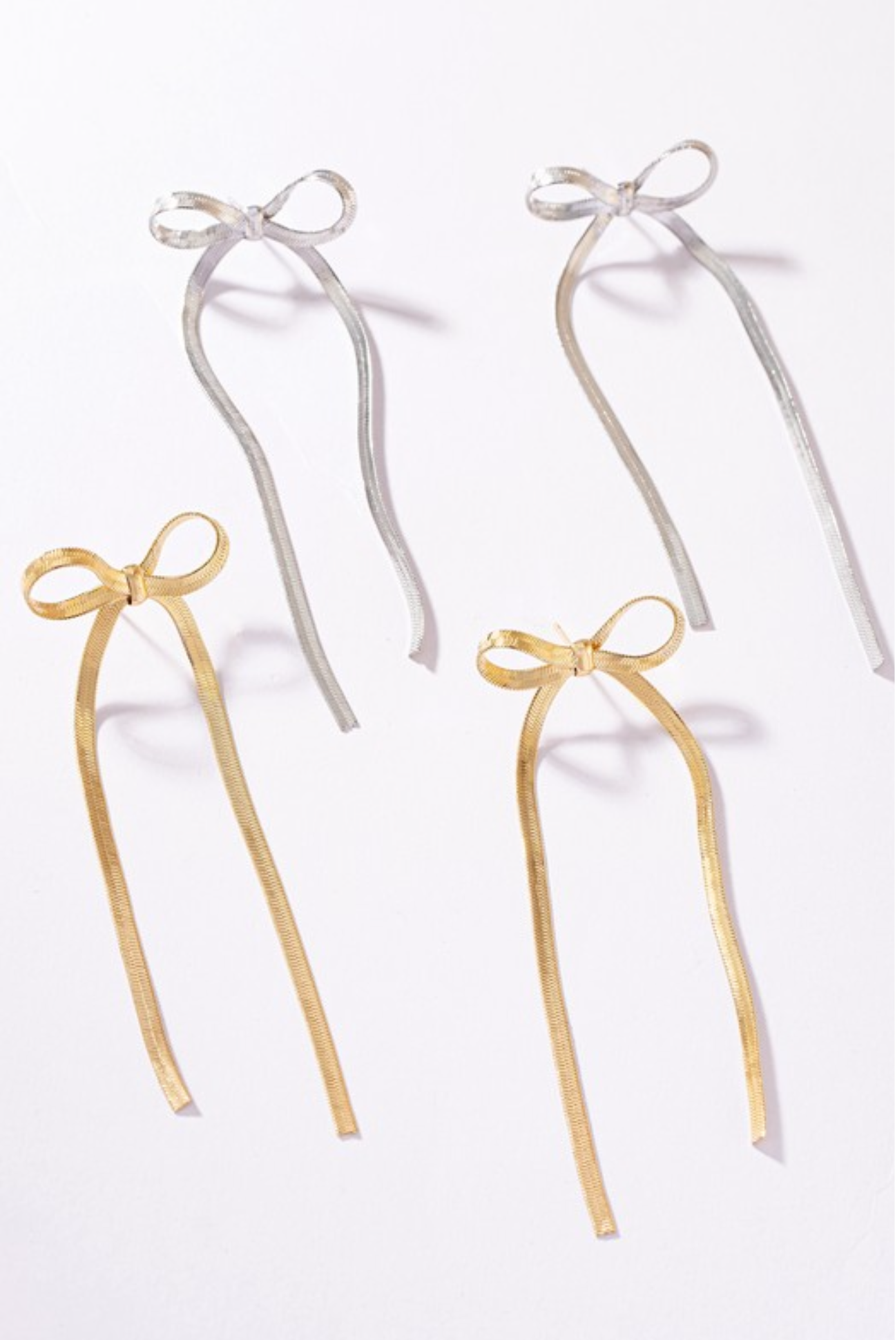 bow gold earrings
